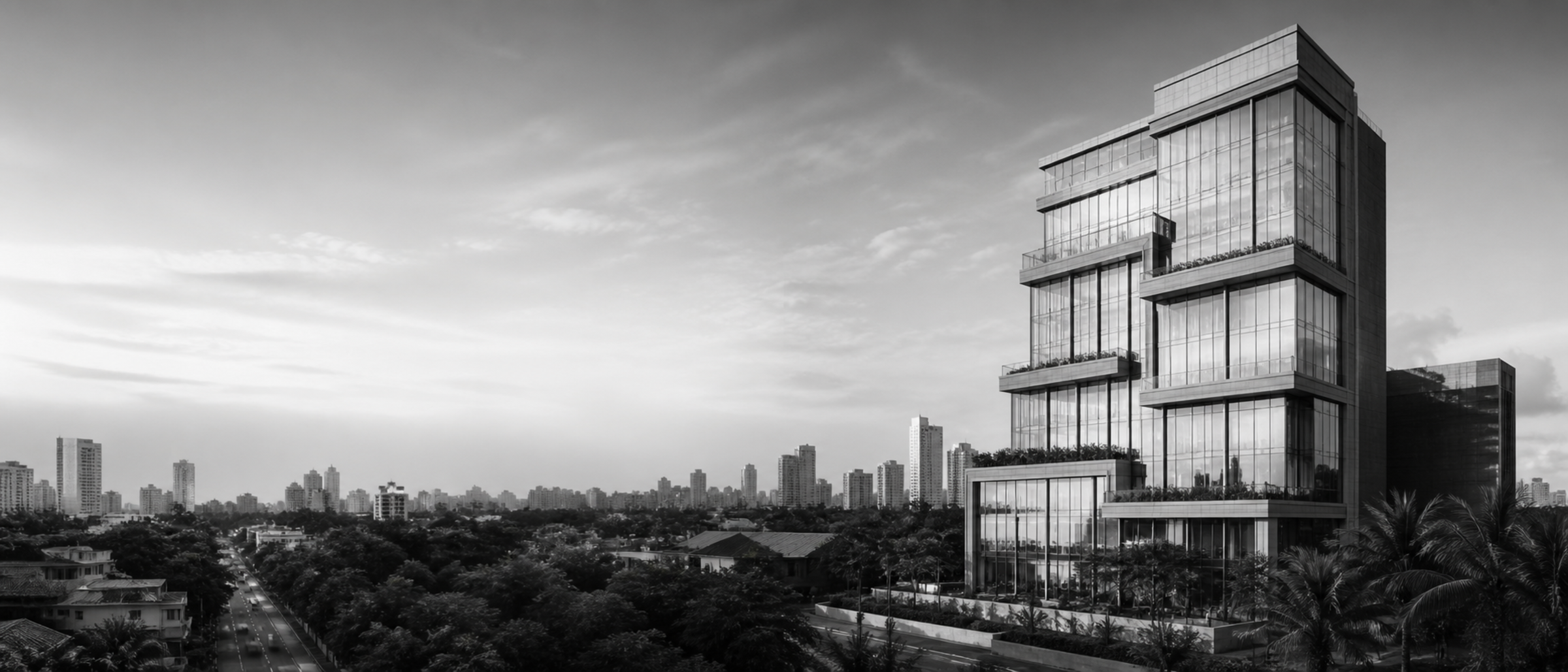Gedung modern dengan panorama kota di kejauhan